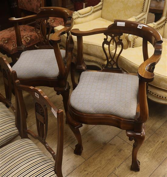 A pair of reproduction mahogany corner chairs